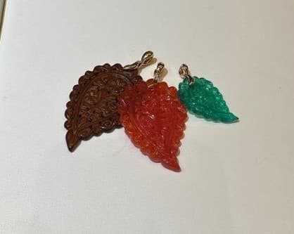 carved pendants by Tamara Comolli