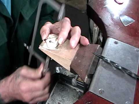 Ball and slot catch